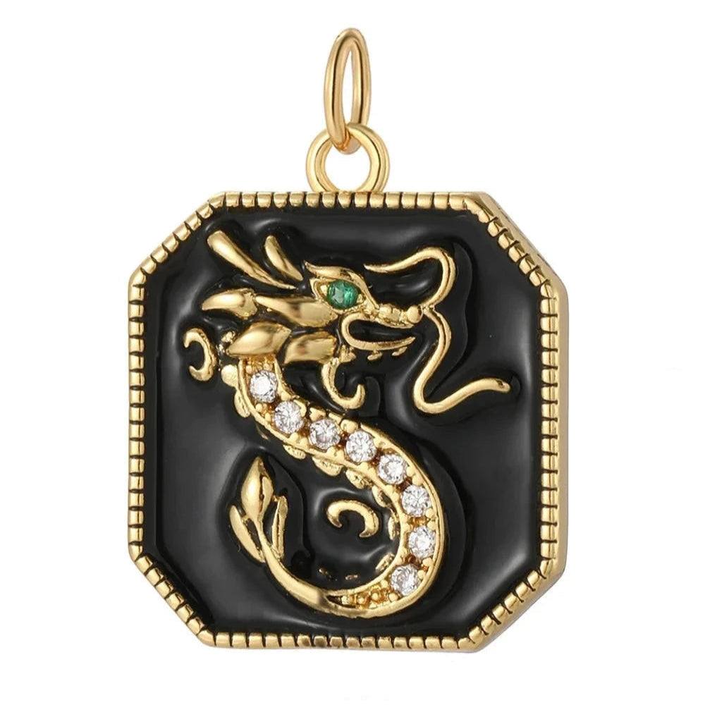 Lóng charm with a golden oriental dragon, green eyes and sleek black enamel—a bold, powerful, symbolic piece for unique, custom statement jewelry.