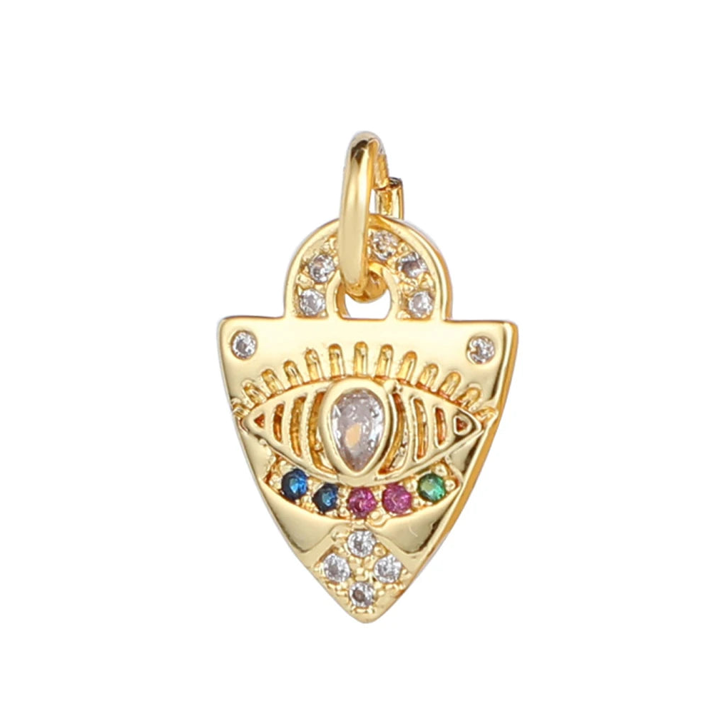 Millennium Pendant charm featuring a shield shape, central gemmed eye, and rainbow stones inspired by mystical relics