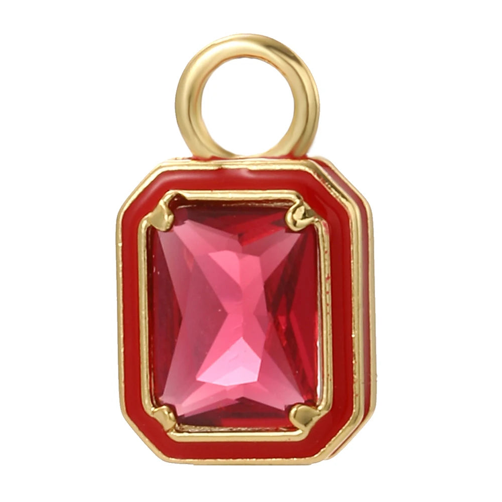 Ruby charm featuring a large red gemstone with a chic, refined and luxurious design. Elegant, sophisticated and timeless, this bold Charmeez charm adds a glamorous pop to custom jewelry, statement bracelets and stylish necklaces