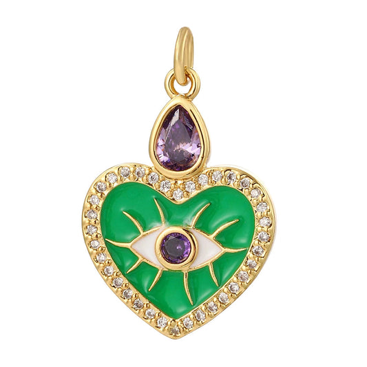 Emerald Look gold evil eye charm with green enamel heart design, photographed for DIY jewelry making